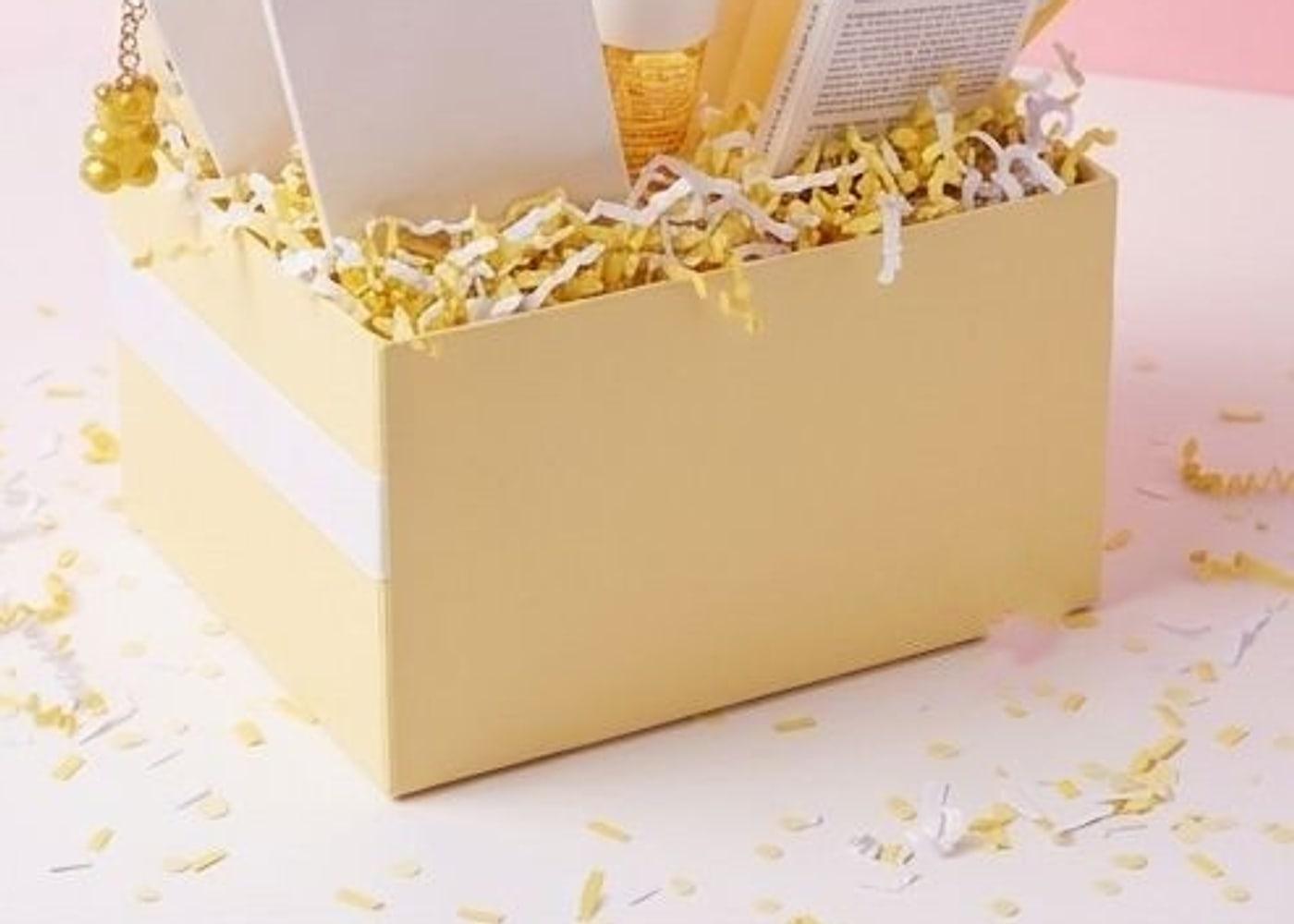 A box filled to the rim with shredded paper