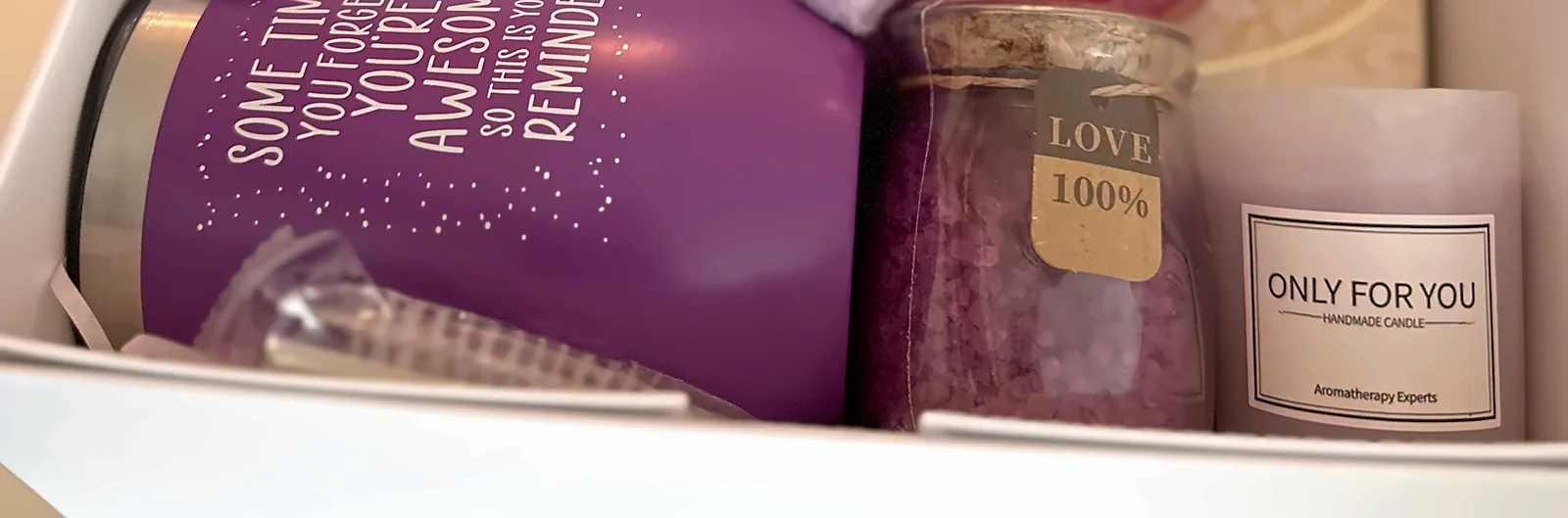 The front of the white box, things set side by side