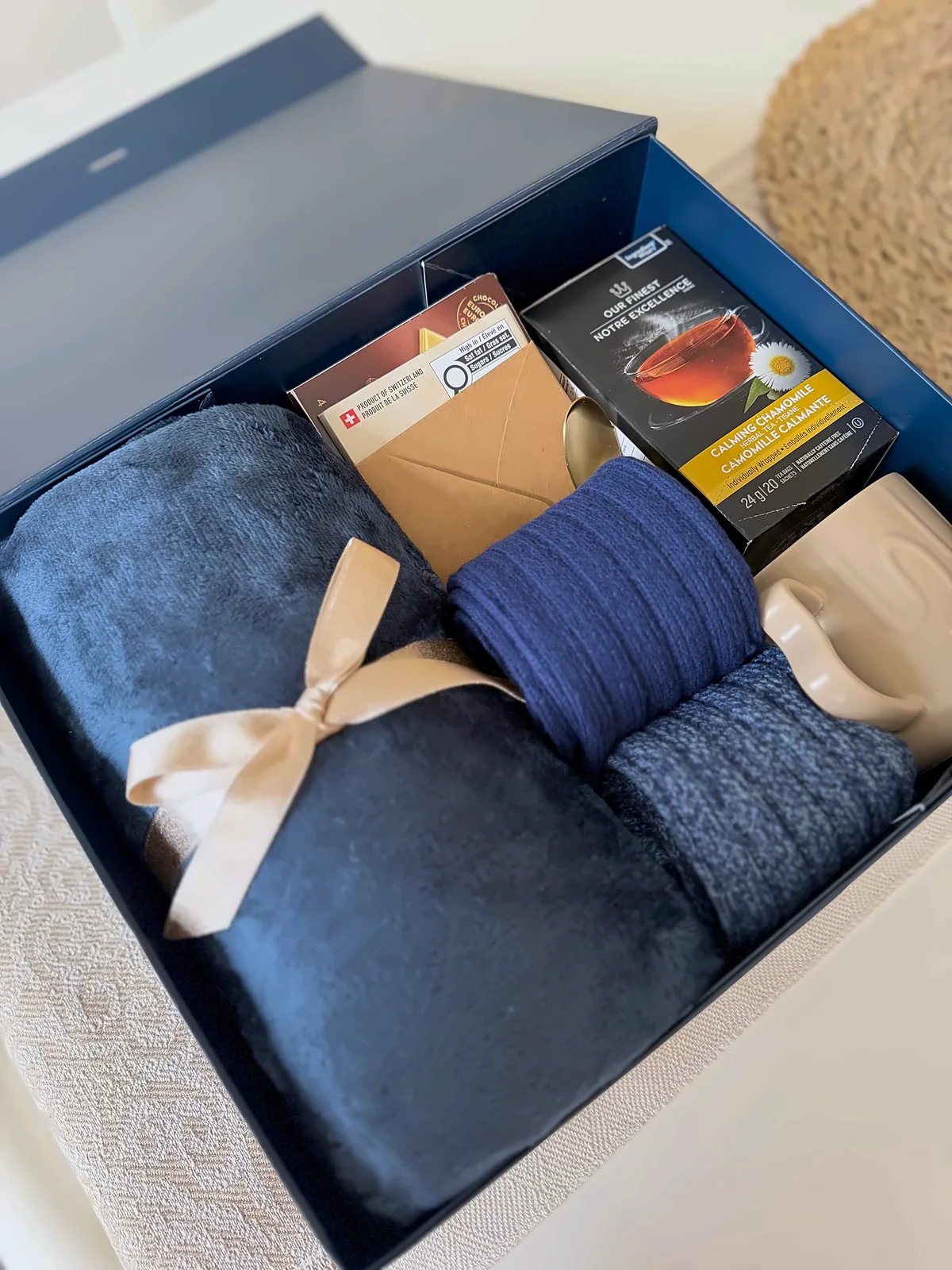 The navy box open, everything set in place